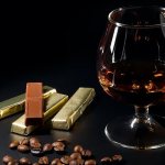 Glass of cognac and chocolate