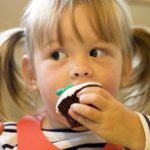 Child eats cake